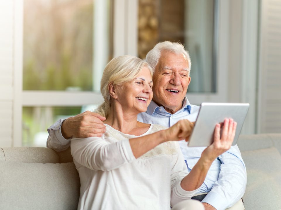 Senior couple on tablet