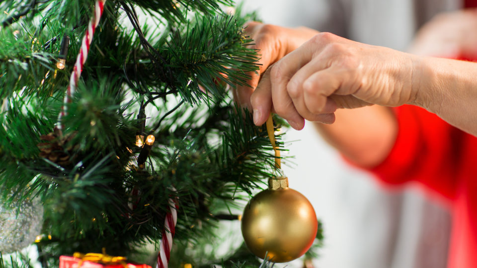 Senior's Hands Decorating Christmas Tree_Lakeshore Senior Living