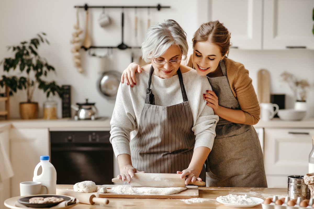 Senior Woman and Adult Daughter Baking_Lakeshore Senior Living